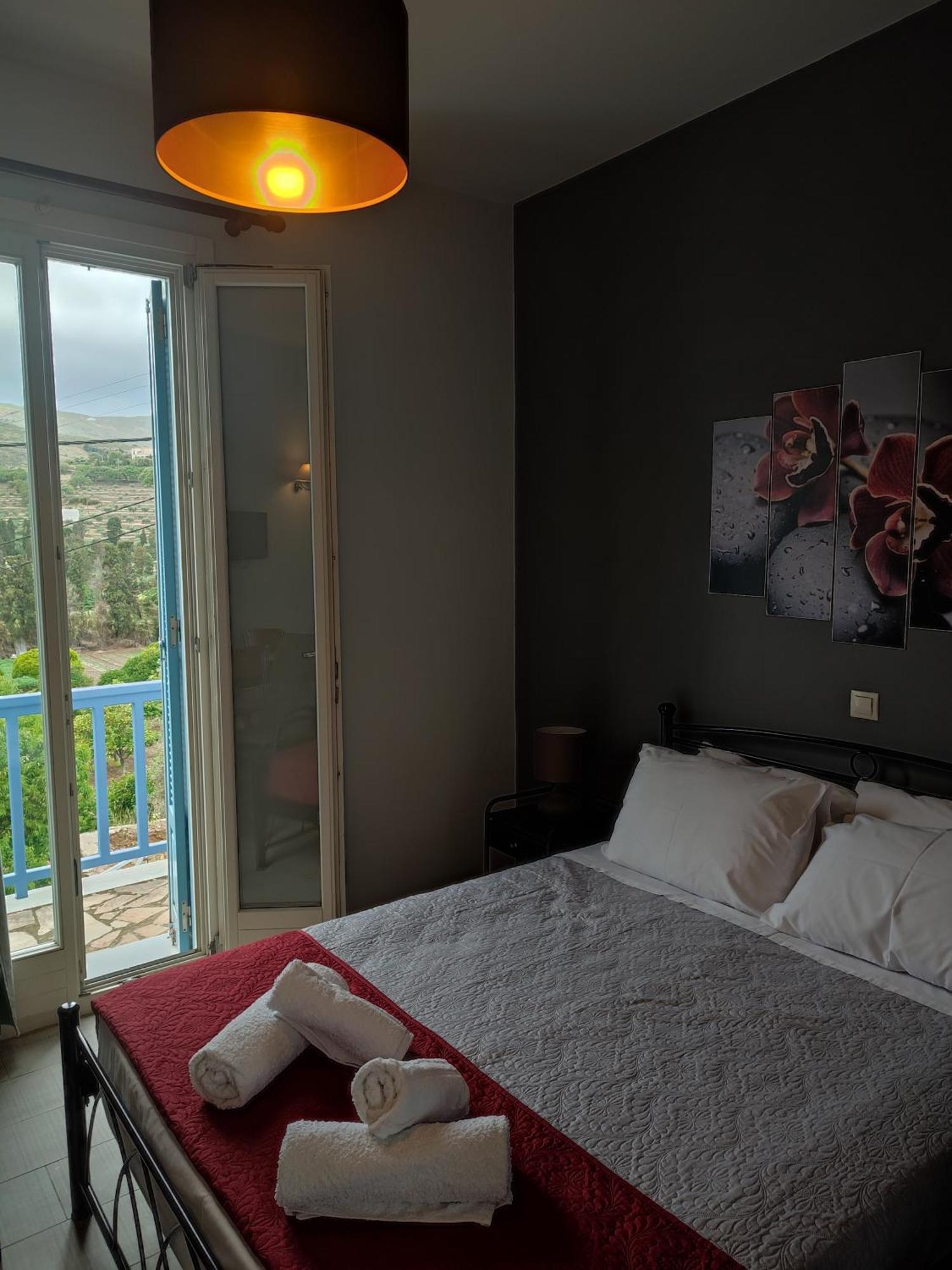 Andros Guesthouses Экстерьер фото