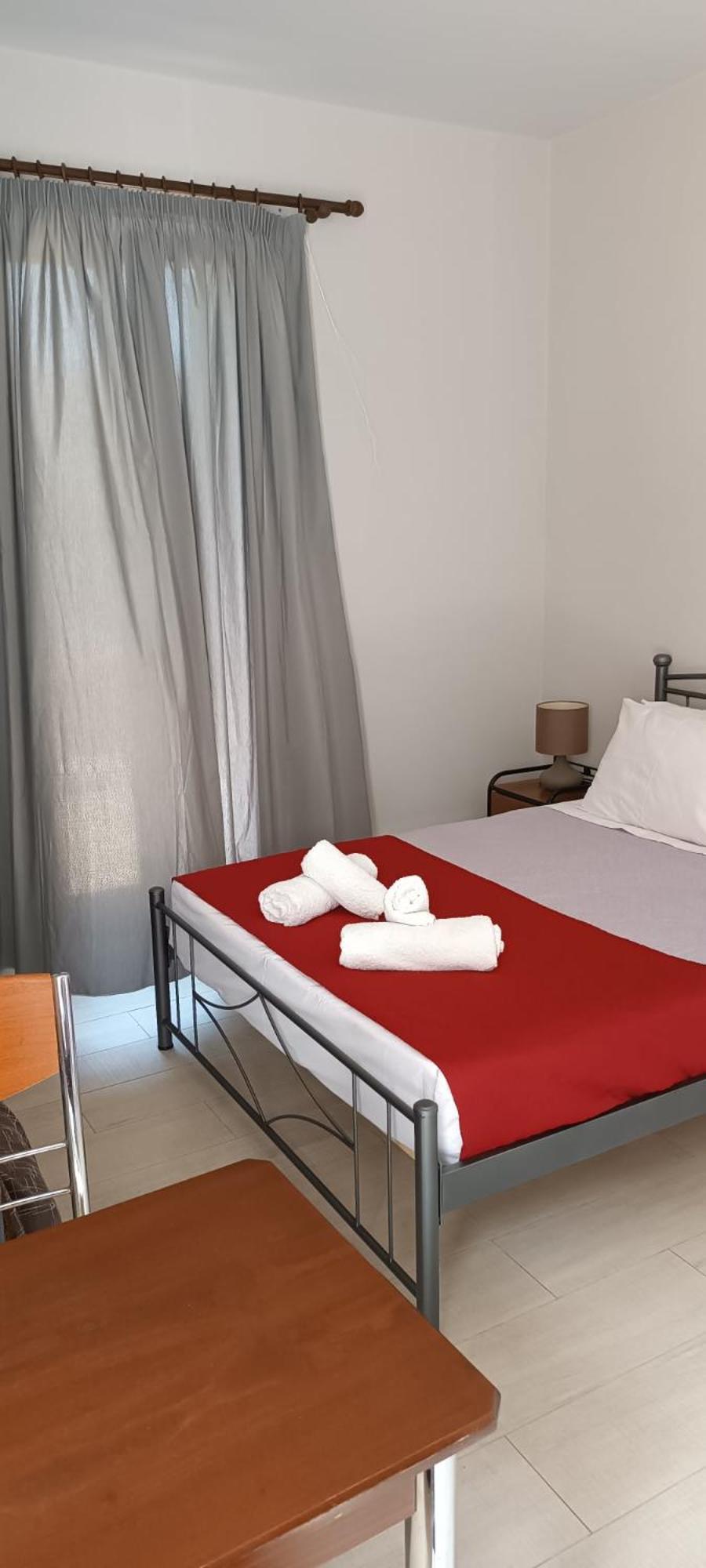 Andros Guesthouses Номер фото
