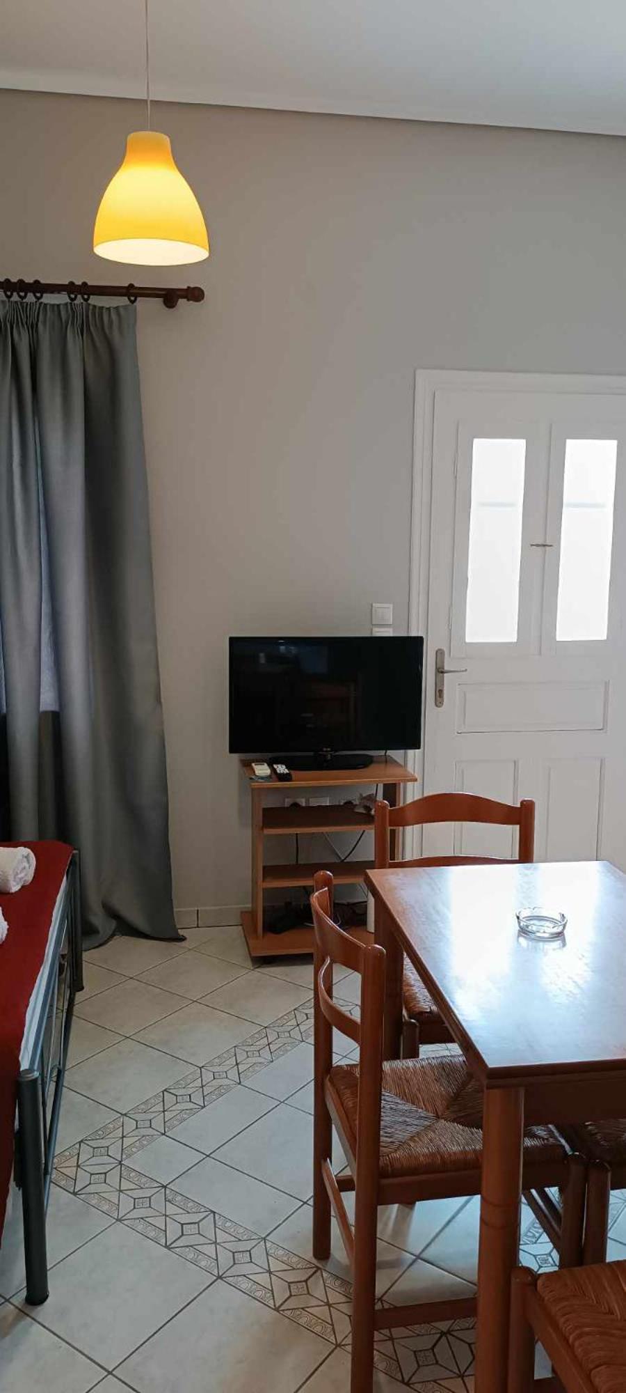 Andros Guesthouses Номер фото
